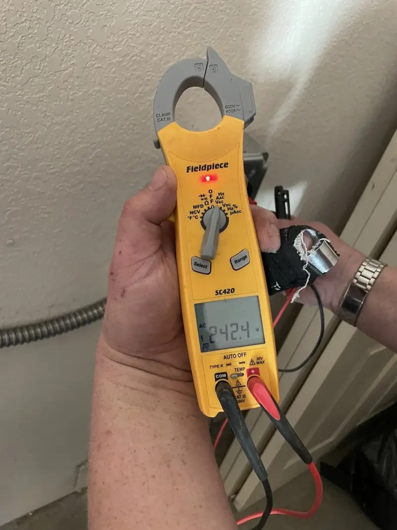 Voltage testing with clamp meter during Electrical Installation Services in Indian Harbour Beach